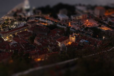 High angle view of illuminated cityscape at night