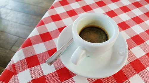 Close-up of coffee cup on table