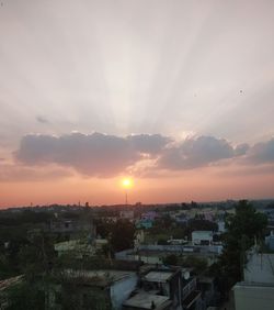 High angle view of townscape against sky during sunset