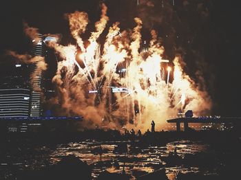 Firework display at night