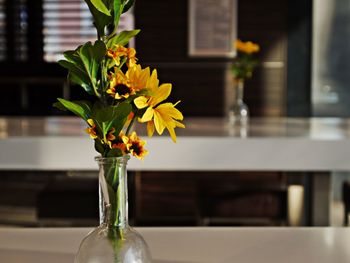 Close-up of flower vase against blurred background