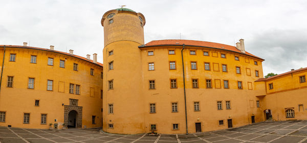 Low angle view of buildings against sky