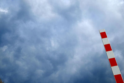 Low angle view of structure against cloudy sky