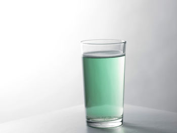 Tablet in a water glass