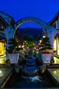 Buildings in city at night