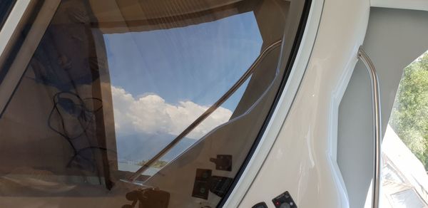 Panoramic view of sky seen through airplane window