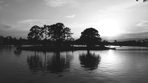 Scenic view of lake at sunset