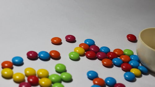 High angle view of multi colored balls on table