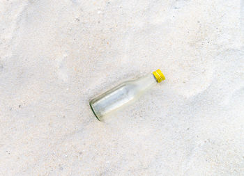 High angle view of cigarette over white background