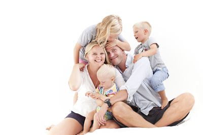 Family with three children, studio shot