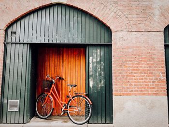 Bicycle against brick wall