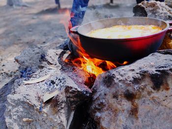 Close-up of food cooking on campfire