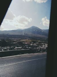 Aerial view of cityscape seen through window