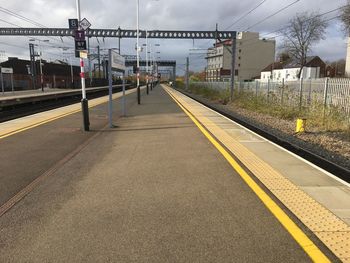 Railroad station platform against sky