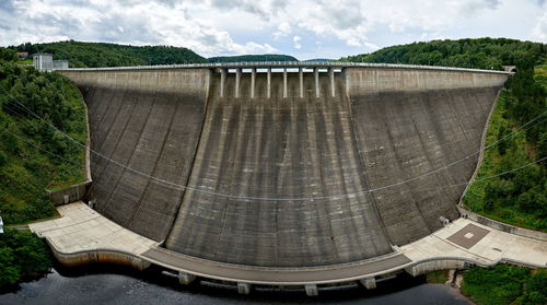 View of dam against cloudy sky