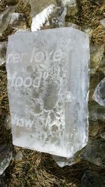 High angle view of frozen water on land