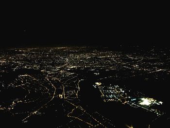 Aerial view of illuminated cityscape