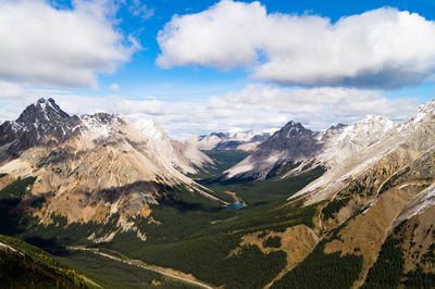 Scenic view of snowcapped mountains against sky