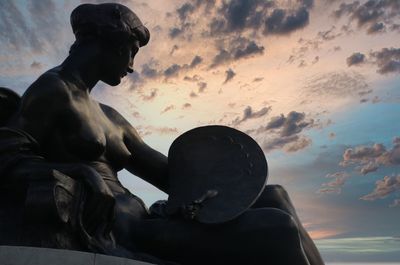 Details of a statue adrning the queen victoria memorial in london