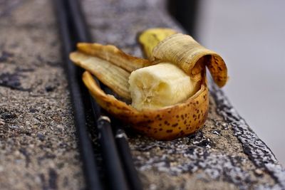 Close-up of bananas on wood