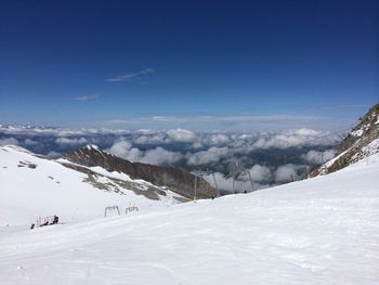 Scenic view of snow covered mountains