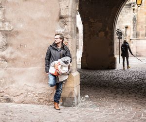 Full length of man standing in city