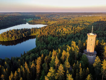 High angle view of trees and buildings against sky