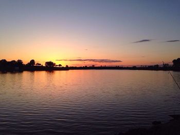 Scenic view of sea at sunset