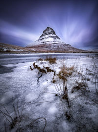 Snow covered mountain against sky