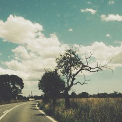 Road passing through field