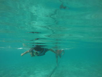 Men snorkeling in sea