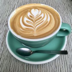 Close-up of cappuccino on table