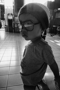 Close-up of boy wearing sunglasses