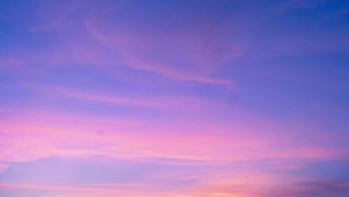 Low angle view of dramatic sky during sunset