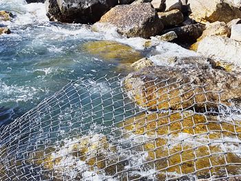 High angle view of rocks on beach