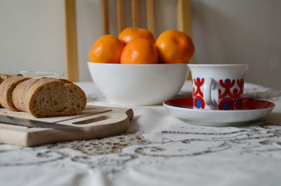 Close-up of fruits in plate on table