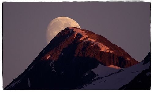 Low angle view of mountains against clear sky