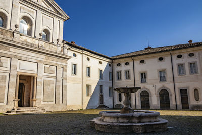 Exterior of historic building against clear blue sky