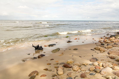 Scenic view of beach against sky