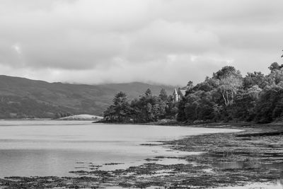 Scenic view of frozen lake against sky