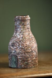 Close-up of old glass jar on table