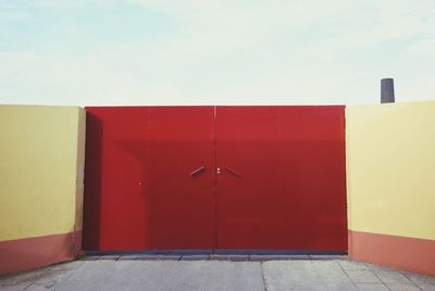 Red door against sky