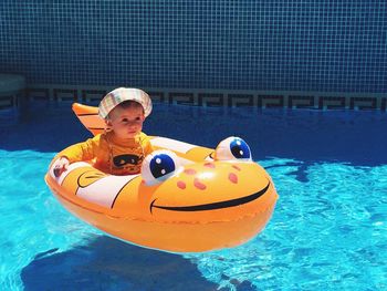 Boy in swimming pool