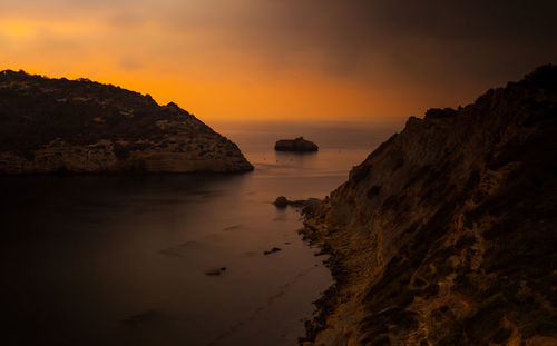 Scenic view of sea against sky during sunset