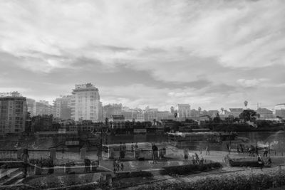 High angle view of buildings in city against sky