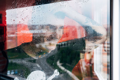 Close-up of wet glass window