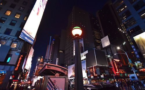 Low angle view of modern building at night