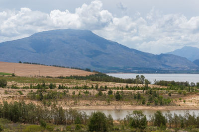 Dry land and lake with mountain on the background landscape view. south africa