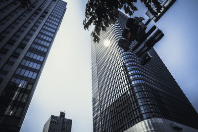 Low angle view of skyscrapers against sky