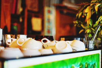 Close-up of coffee cup in restaurant